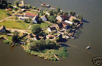 Reetgedecktes Ferienhaus direkt am Wasser nahe der Insel Usedom - Freie Termine!